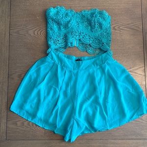 Strapless shorts romper w/ hook & eye & zip closure. tags still on. small.
